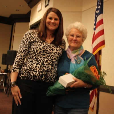 Stephanie McCurdy presenting roses and a gift to retiring historian, Viola Beatty. Stephanie McCurdy presenting roses and a gift to retiring historian, Viola Beatty.