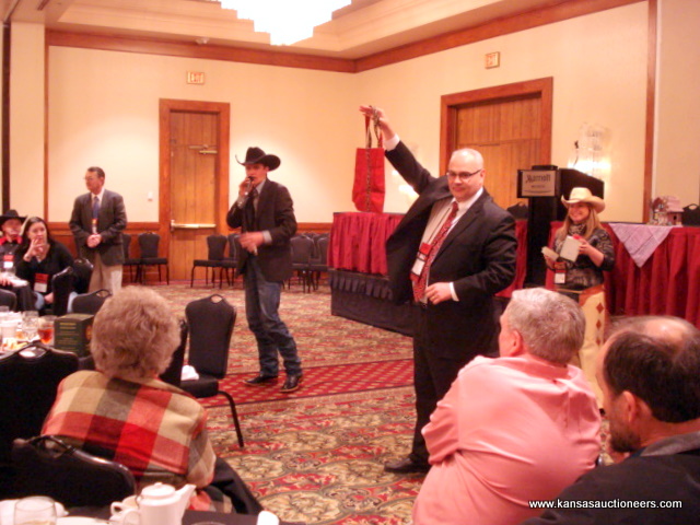 Blaine Lotz sells at the KAA Auxiliary fun auction Blaine Lotz sells at the KAA Auxiliary fun auction