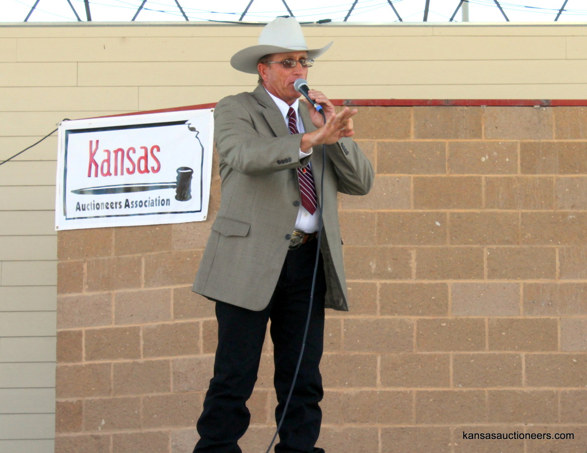 Justin Banzhaf competing in the 2015 Kansas Auctioneer finals. Justin Banzhaf competing in the 2015 Kansas Auctioneer finals.