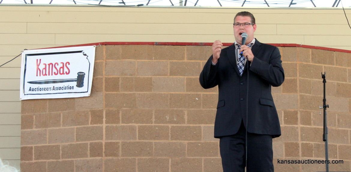Michael Burkhart competing in the 2015 Kansas Auctioneer finals. Michael Burkhart competing in the 2015 Kansas Auctioneer finals.