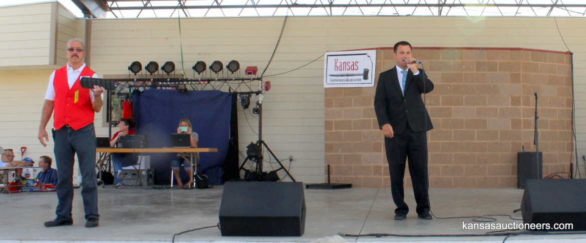 Titus Yutzy competing in the 2015 Kansas Auctioneer finals. Titus Yutzy competing in the 2015 Kansas Auctioneer finals.