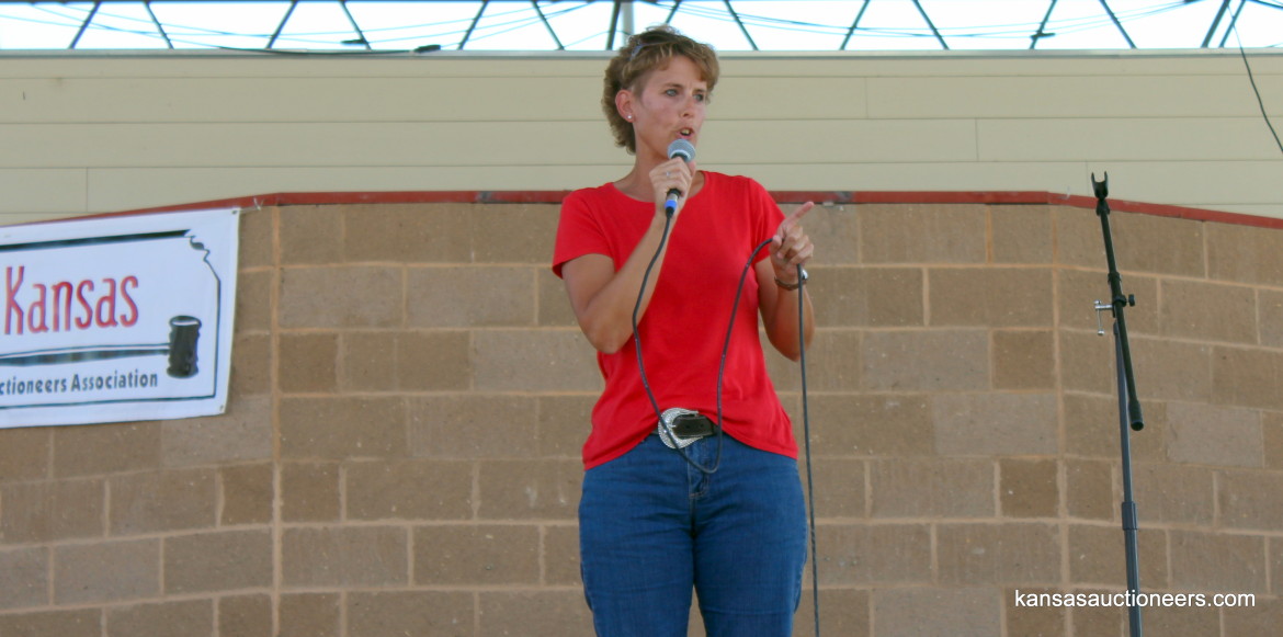 2015 Kansas Auctioneer Championship finals judge, Regina Andrijeski, sells an item. 2015 Kansas Auctioneer Championship finals judge, Regina Andrijeski, sells an item.