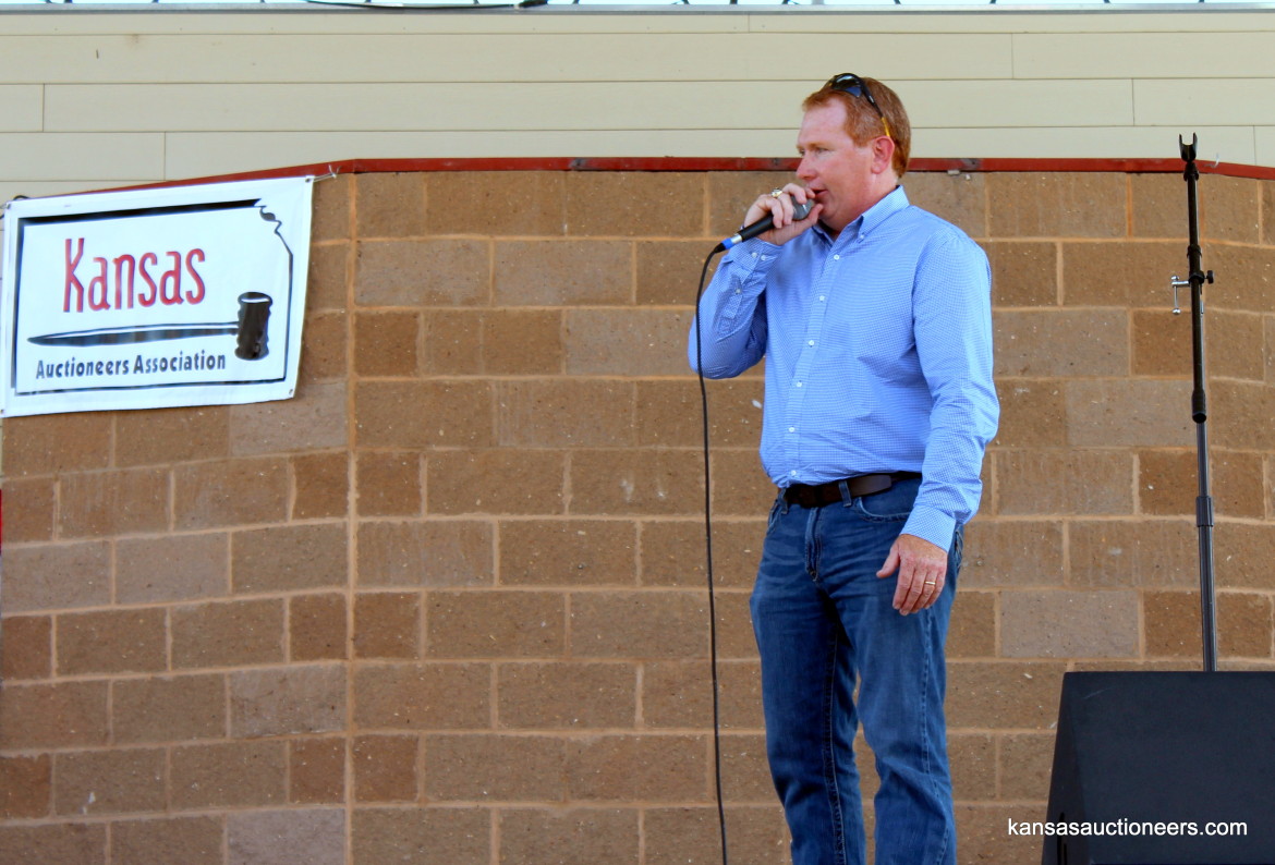 2015 Kansas Auctioneer Championship finals judge, Troy Lippard, sells an item. 2015 Kansas Auctioneer Championship finals judge, Troy Lippard, sells an item.