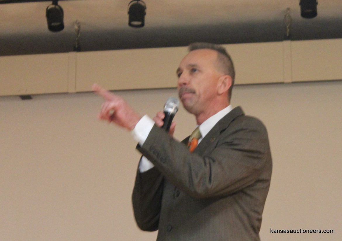 Arlin Eicher competing in the 2016 Kansas Auctioneer Preliminaries. Arlin Eicher competing in the 2016 Kansas Auctioneer Preliminaries.