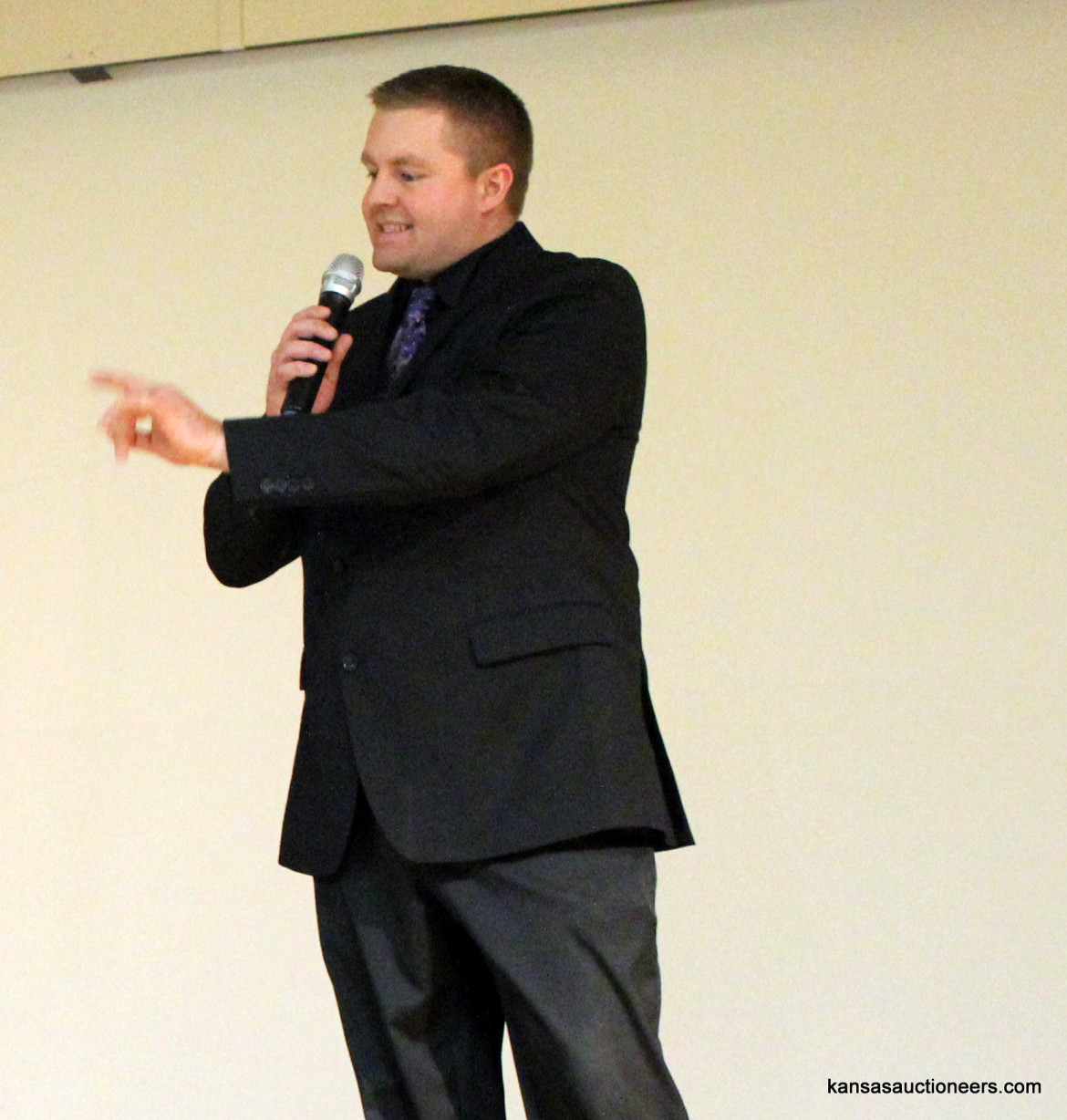 Josh Miller competing in the 2016 Kansas Auctioneer Preliminaries. Josh Miller competing in the 2016 Kansas Auctioneer Preliminaries.