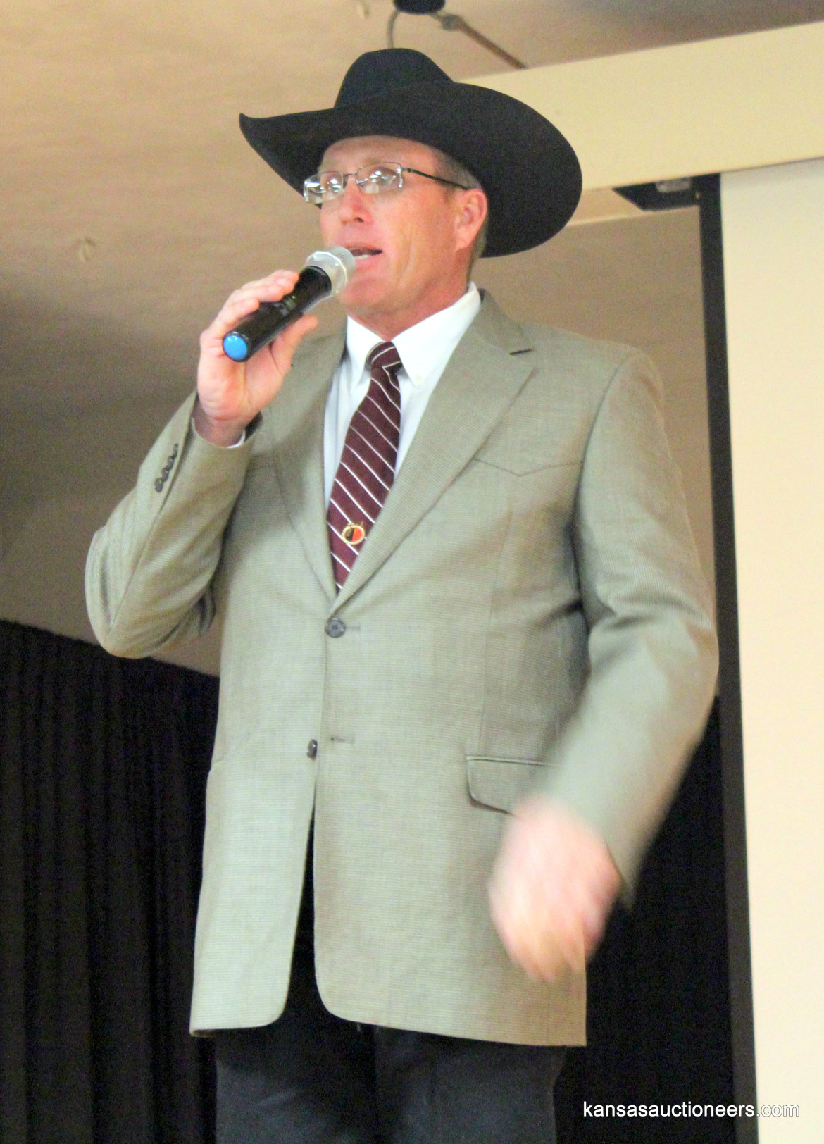 Justin Banzhaf competing in the 2016 Kansas Auctioneer Preliminaries. Justin Banzhaf competing in the 2016 Kansas Auctioneer Preliminaries.
