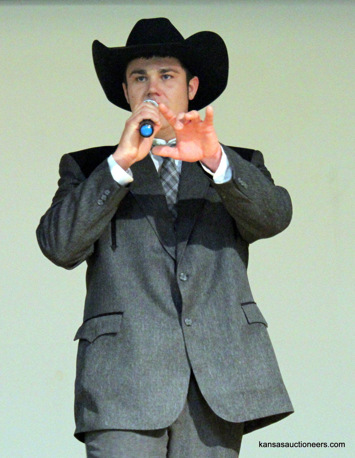 Jase Hubert competing in the 2016 Kansas Auctioneer Preliminaries. Jase Hubert competing in the 2016 Kansas Auctioneer Preliminaries.