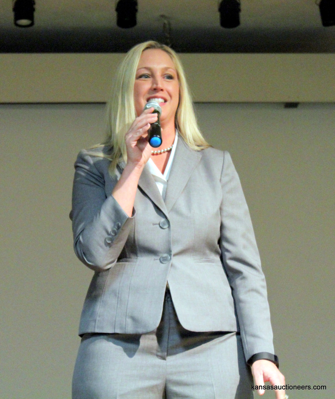 Trisha Brauer competing in the 2016 Kansas Auctioneer Preliminaries. Trisha Brauer competing in the 2016 Kansas Auctioneer Preliminaries.