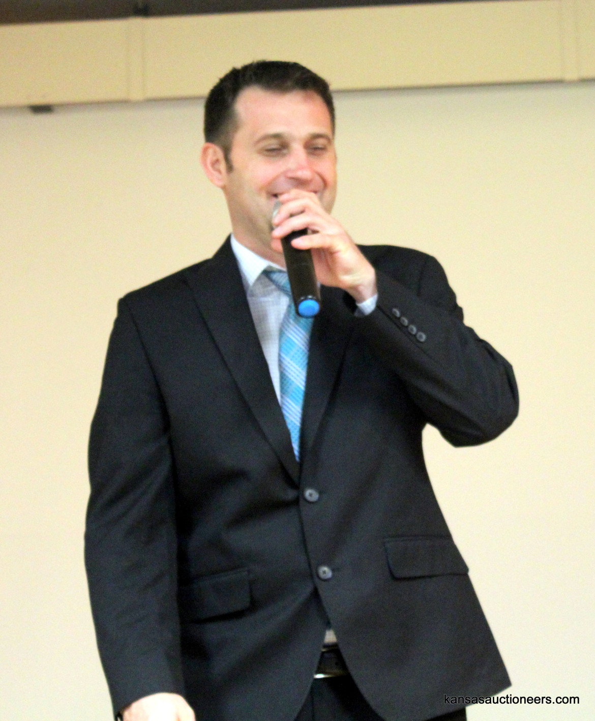 Titus Yutzy competing in the 2016 Kansas Auctioneer Preliminaries. Titus Yutzy competing in the 2016 Kansas Auctioneer Preliminaries.