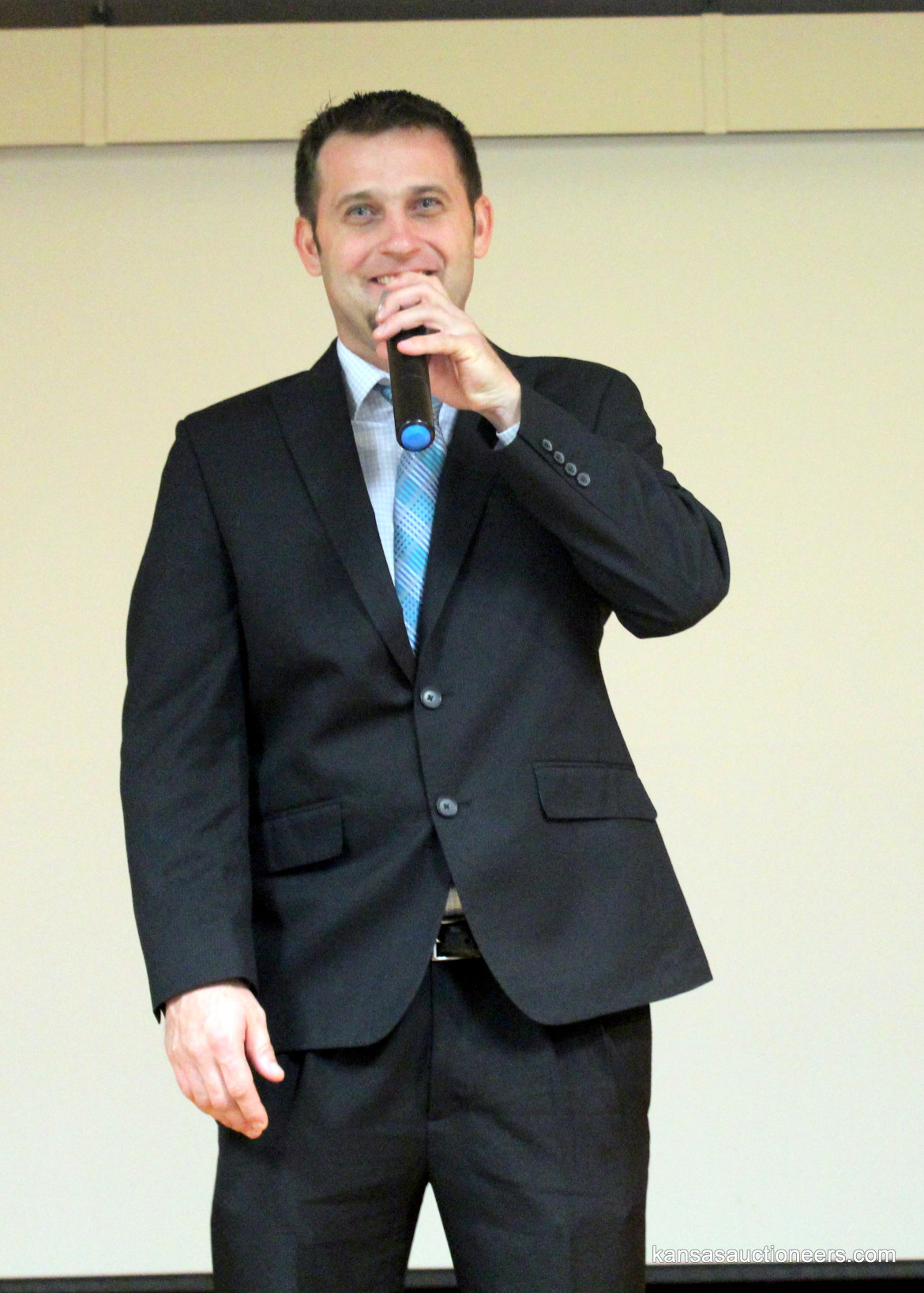 Titus Yutzy competing in the 2016 Kansas Auctioneer Preliminaries. Titus Yutzy competing in the 2016 Kansas Auctioneer Preliminaries.