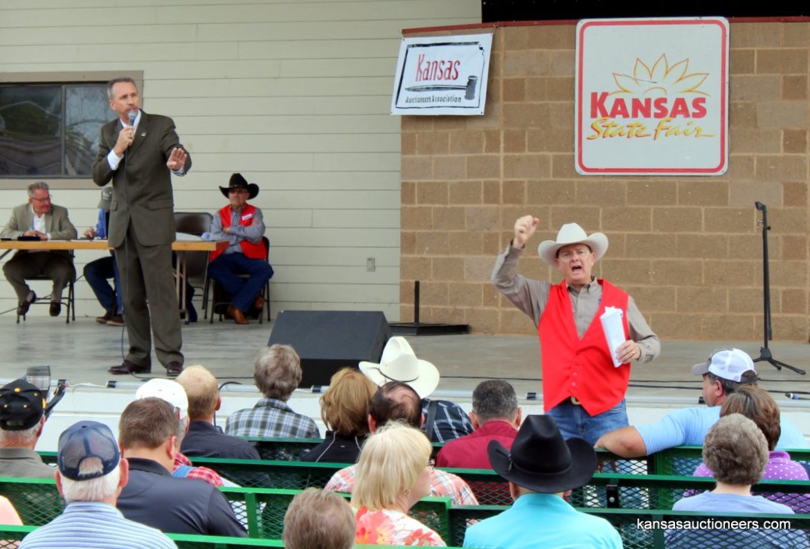 Tony Wisely competes with Lance Fullerton taking bids.